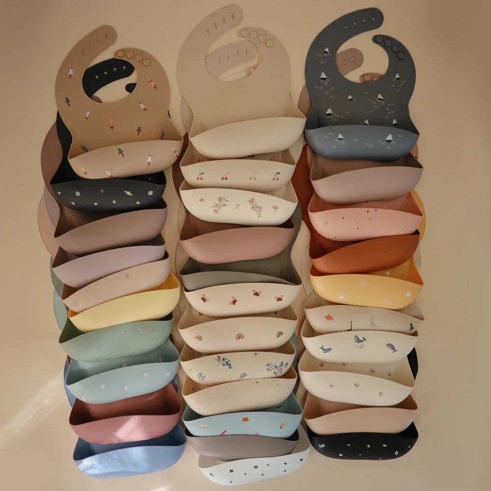 Mushie Bavoir Bébé en Silicone - Arcs-en-ciel